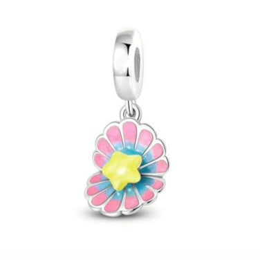 Floral charm with pink and blue petals on a white background