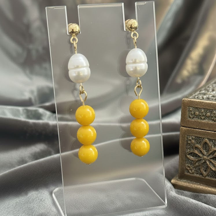 ပုလဲလည်စည်းစုစည်းမှု - နားကပ် - အေဂိတ်အဝါရောင်